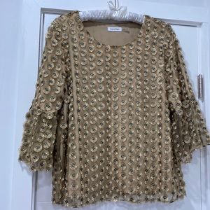 Authentic Calvin Klein gold appliquéd tunic with bell sleeves.